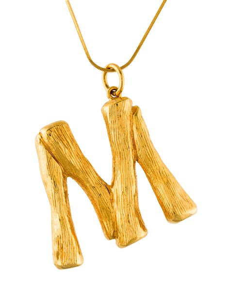 celine letter pendant necklace in brass|celine bracelet alphabet.